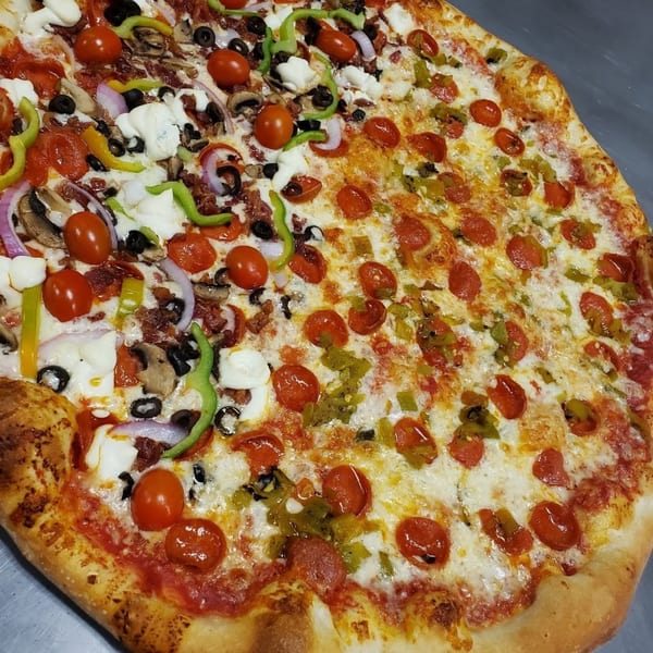 NYP Slice House Pizza with half pepperoni and half supreme toppings including tomatoes, onions, and peppers.